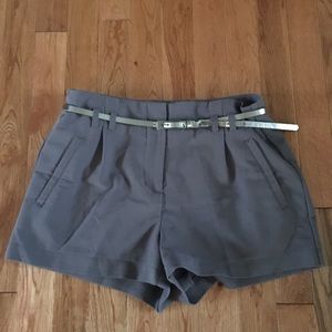Gray shorts with silver belt included